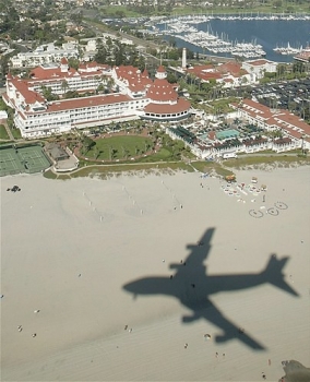 The shadow of Air Force One passes over the beach in front of the historic Hotel del Coronado in Coronado, Calif., Monday, Aug. 29, 2005. • <a style="font-size:0.8em;" href="http://www.flickr.com/photos/139546847@N02/30021429550/" target="_blank">View on Flickr</a>