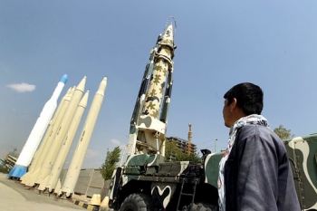 A man looks at Iranian-made missiles at Holy Defence Museum in Tehran on September 23, 2015. • <a style="font-size:0.8em;" href="http://www.flickr.com/photos/139546847@N02/25077145072/" target="_blank">View on Flickr</a>